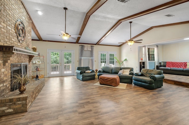 9025 Buck Lake Rd, Tallahassee, FL 32317 - living area with ceiling fan, wood finished floors, plenty of natural light, and a textured ceiling