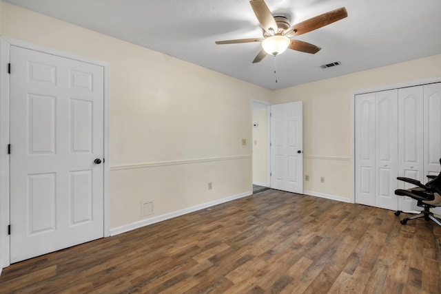 9025 Buck Lake Rd, Tallahassee, FL 32317 - unfurnished bedroom featuring wood finished floors, baseboards, ceiling fan, and a closet