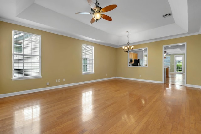 3248 Newberry Blvd, Tallahassee, FL 32311 - empty room with a raised ceiling, ceiling fan, light wood-type flooring, and ornamental molding