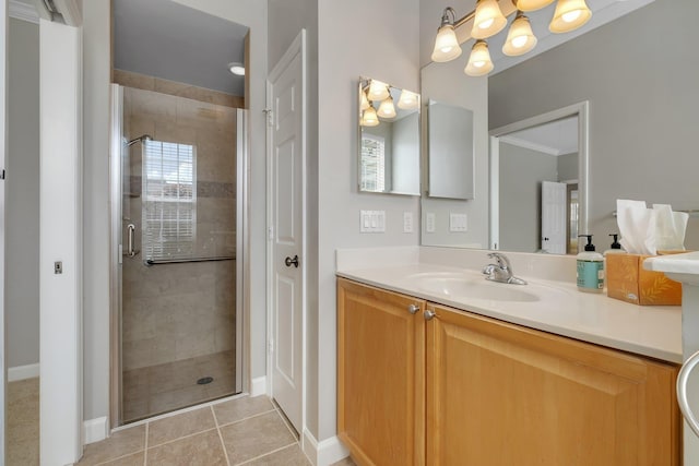 3248 Newberry Blvd, Tallahassee, FL 32311 - full bathroom with a shower stall, baseboards, vanity, and tile patterned flooring