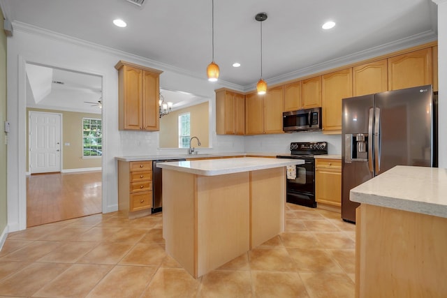 3248 Newberry Blvd, Tallahassee, FL 32311 - kitchen featuring stainless steel appliances, a sink, light countertops, a center island, and backsplash
