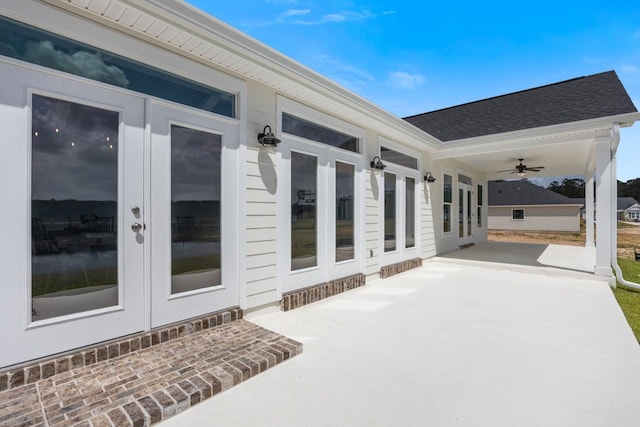 view of patio / terrace with a ceiling fan and french doors