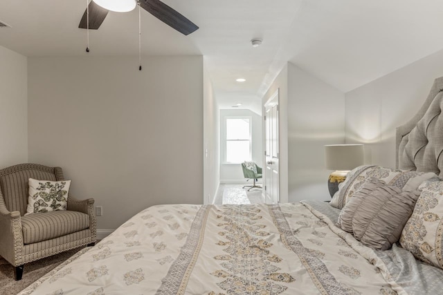 bedroom with carpet floors, visible vents, ceiling fan, and baseboards