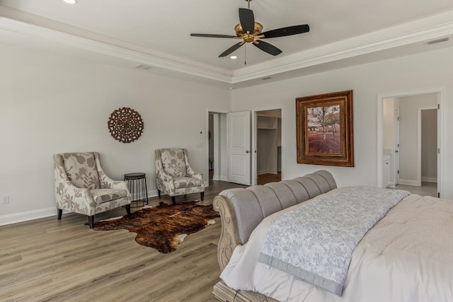 bedroom featuring recessed lighting, visible vents, baseboards, ornamental molding, and light wood-type flooring