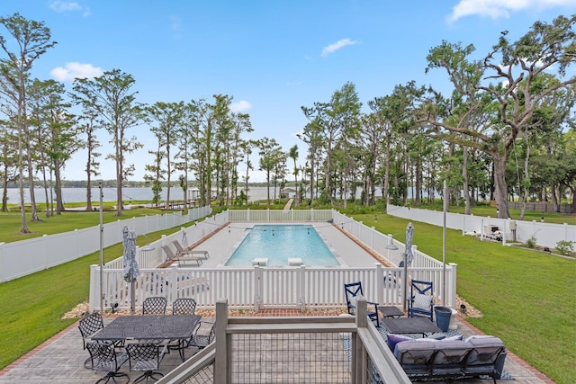 2845 NE Cherry Lake Cir, Pinetta Madison County, FL 32350 - view of pool with a water view, a patio area, and outdoor dining space