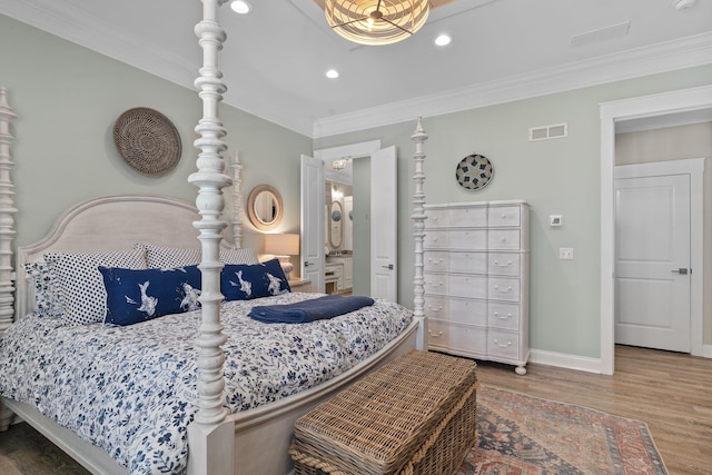 2845 NE Cherry Lake Cir, Pinetta Madison County, FL 32350 - bedroom with wood finished floors, ornamental molding, baseboards, and recessed lighting