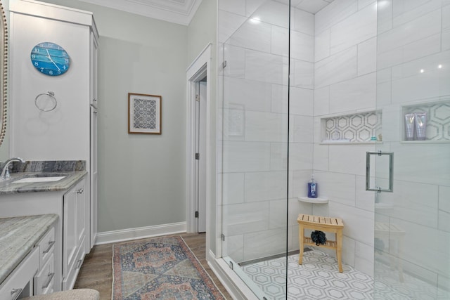 2845 NE Cherry Lake Cir, Pinetta Madison County, FL 32350 - bathroom featuring ornamental molding, a stall shower, baseboards, and vanity