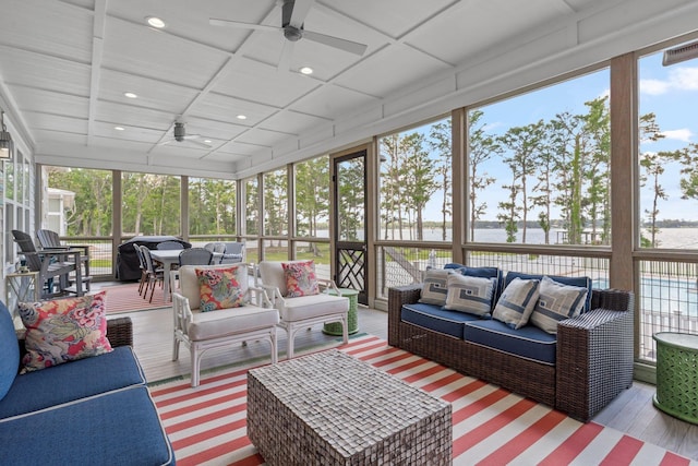 2845 NE Cherry Lake Cir, Pinetta Madison County, FL 32350 - sunroom / solarium featuring a ceiling fan, an outdoor hangout area, a water view, and coffered ceiling