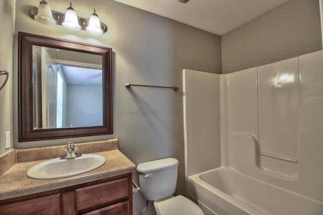 full bathroom with toilet, washtub / shower combination, and vanity