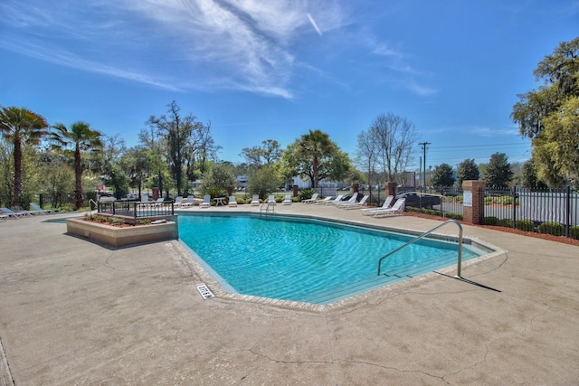 view of pool featuring a patio