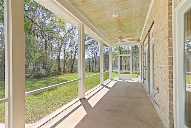 3621 Moody Trl, Tallahassee, FL 32309 - unfurnished sunroom featuring a ceiling fan