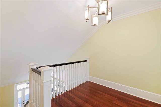 3621 Moody Trl, Tallahassee, FL 32309 - stairway with a chandelier, wood finished floors, baseboards, and ornamental molding