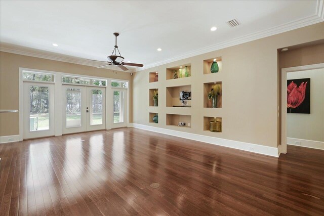 3621 Moody Trl, Tallahassee, FL 32309 - unfurnished living room with built in shelves, hardwood / wood-style flooring, ceiling fan, baseboards, and french doors