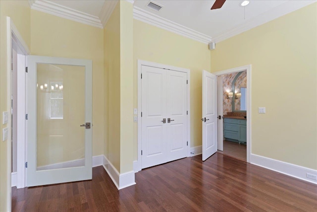 3621 Moody Trl, Tallahassee, FL 32309 - unfurnished bedroom featuring ornamental molding, wood finished floors, a closet, and baseboards