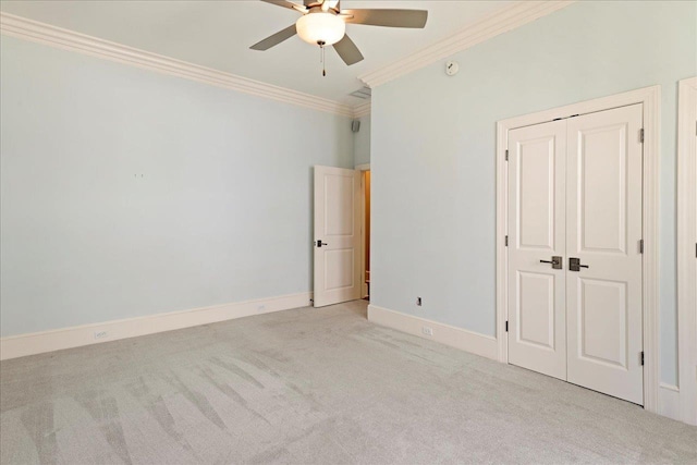 3621 Moody Trl, Tallahassee, FL 32309 - unfurnished bedroom with carpet flooring, crown molding, baseboards, a closet, and a ceiling fan