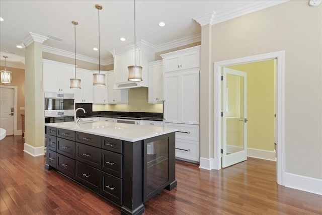 3621 Moody Trl, Tallahassee, FL 32309 - kitchen featuring white cabinetry, wine cooler, baseboards, dark wood-type flooring, and ornamental molding