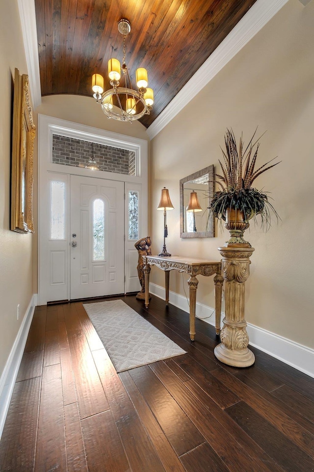 foyer with a notable chandelier, wood ceiling, dark wood-type flooring, and vaulted ceiling