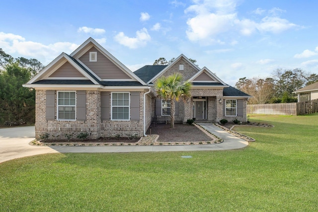 craftsman-style home with a front lawn