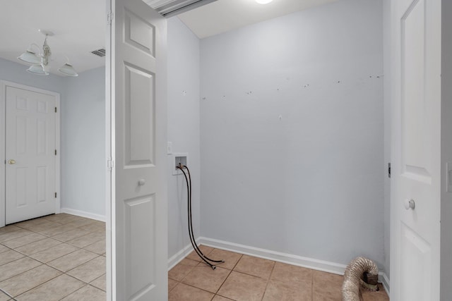 2738 W Tharpe St Unit 806, Tallahassee, FL 32303 - laundry area featuring light tile patterned floors and hookup for a washing machine
