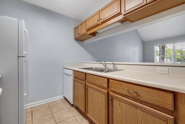 2738 W Tharpe St Unit 806, Tallahassee, FL 32303 - kitchen with white appliances, light countertops, vaulted ceiling, and light tile patterned floors