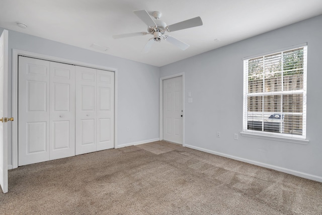 2738 W Tharpe St Unit 806, Tallahassee, FL 32303 - unfurnished bedroom featuring carpet, a closet, and a ceiling fan