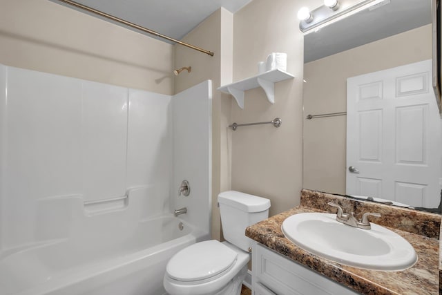 full bathroom featuring toilet, tub / shower combination, and vanity