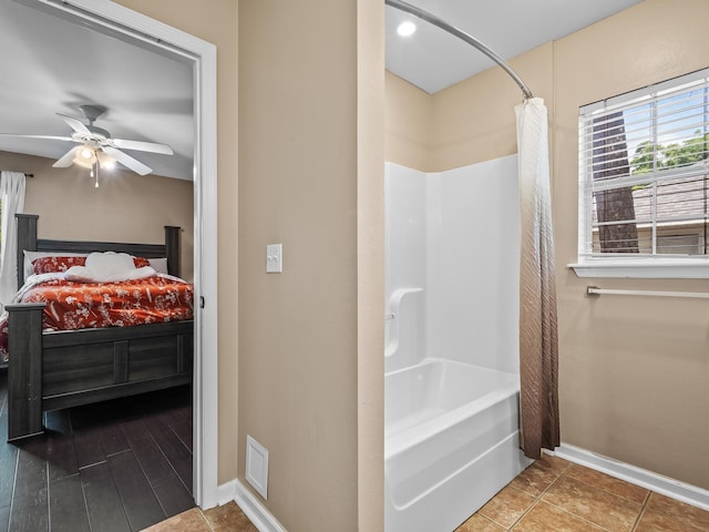 100 Ej Stringer Rd, Crawfordville, FL 32327 - bathroom with shower / bathtub combination with curtain and ceiling fan