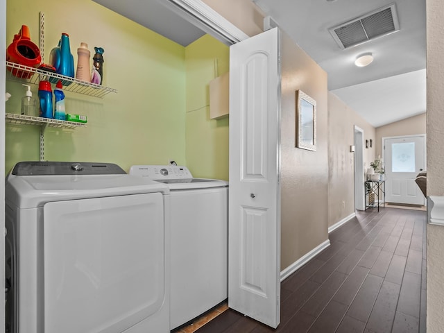 100 Ej Stringer Rd, Crawfordville, FL 32327 - laundry room with washer and clothes dryer and dark wood-type flooring