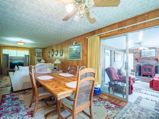 3364 NW 66th Blvd, Jennings, FL 32053 - dining area with ceiling fan, wooden walls, and wood finished floors