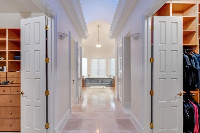 3899 W Millers Bridge Rd, Tallahassee, FL 32312 - hall with crown molding and light tile patterned floors
