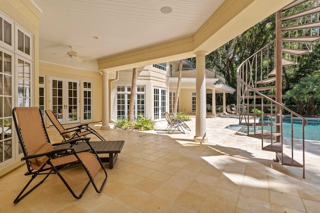 3899 W Millers Bridge Rd, Tallahassee, FL 32312 - view of patio / terrace featuring french doors, stairway, an outdoor pool, and ceiling fan