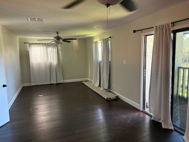 spare room featuring dark hardwood / wood-style floors