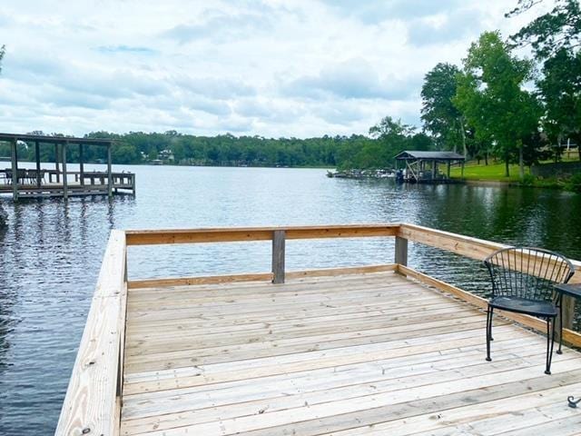 view of dock with a water view