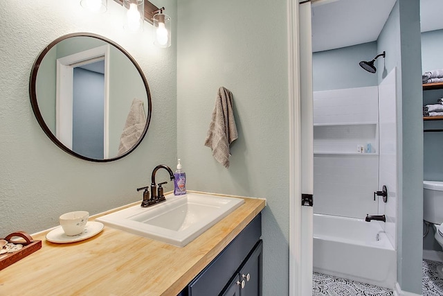 full bathroom with toilet, tile patterned flooring, bathing tub / shower combination, and vanity