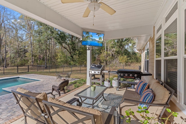 view of patio / terrace with ceiling fan, a fenced backyard, outdoor lounge area, a grill, and a fenced in pool