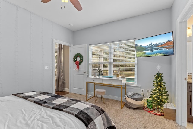 bedroom featuring carpet, ceiling fan, and baseboards