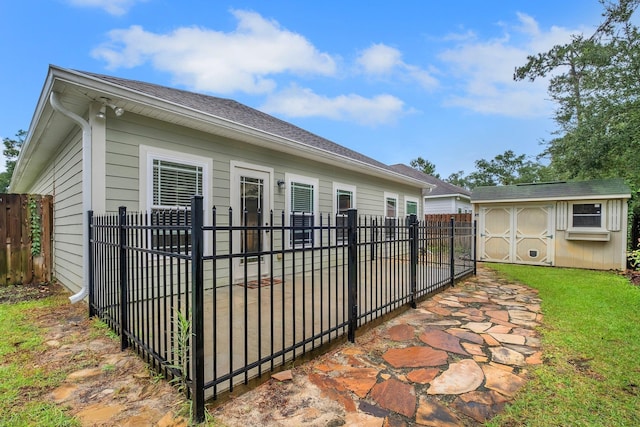 exterior space with a storage shed