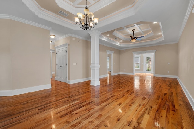 interior space with ceiling fan with notable chandelier, decorative columns, ornamental molding, and coffered ceiling