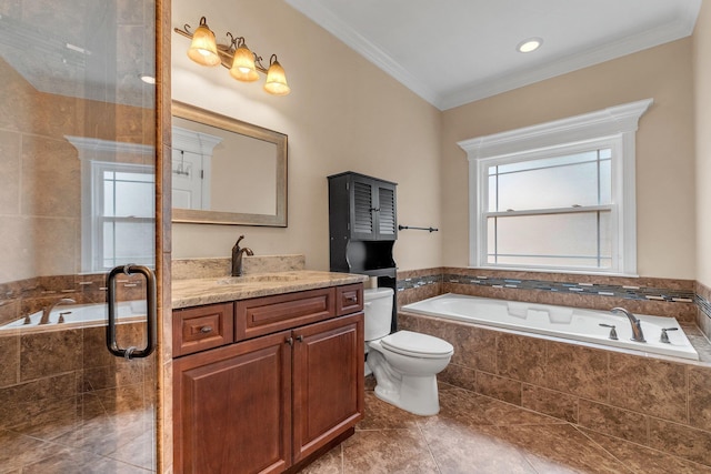 bathroom with tiled bath, crown molding, vanity, and toilet