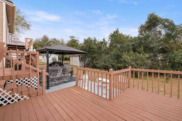 wooden deck with a gazebo