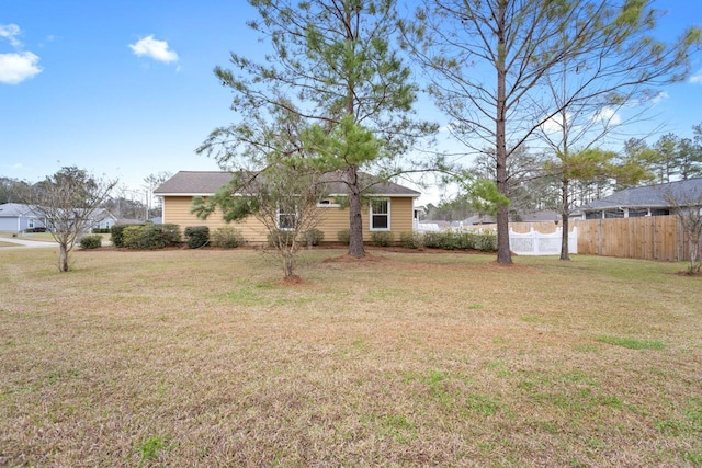 view of yard featuring fence