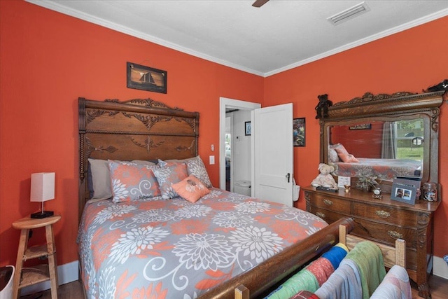 514 N Calhoun St, Perry, FL 32347 - bedroom with crown molding and wood finished floors
