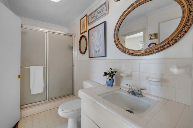 bathroom featuring toilet, crown molding, an enclosed shower, and vanity