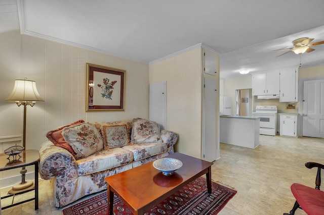 living room with ceiling fan and crown molding