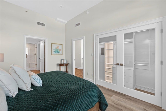 300 S Duval St Unit 2209, Tallahassee, FL 32301 - living room featuring wood finished floors, a fireplace, and a high ceiling