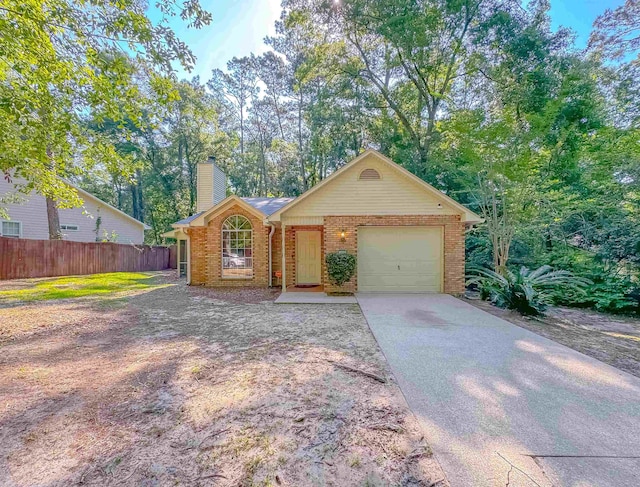 ranch-style house featuring a garage