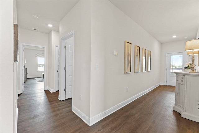 hallway featuring dark hardwood / wood-style floors