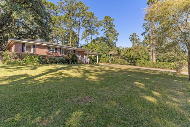 view of front of home with a front lawn