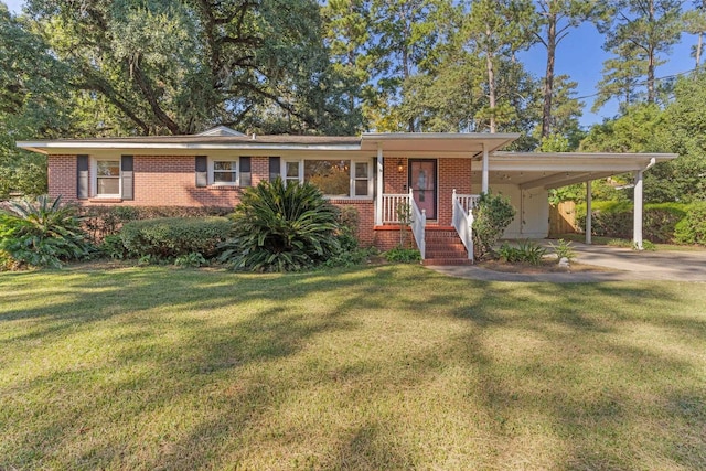 view of front facade with a front lawn and a carport