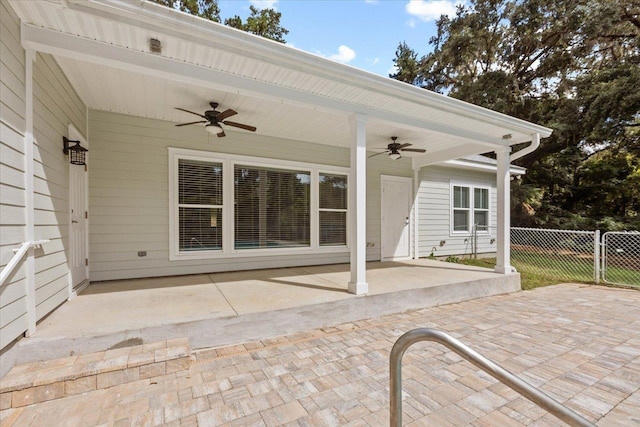 view of patio featuring ceiling fan